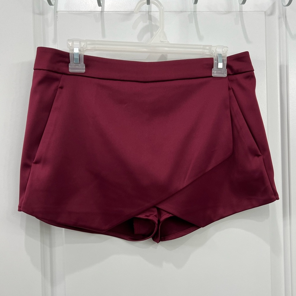 Express burgundy skirt/shorts size 8. $40